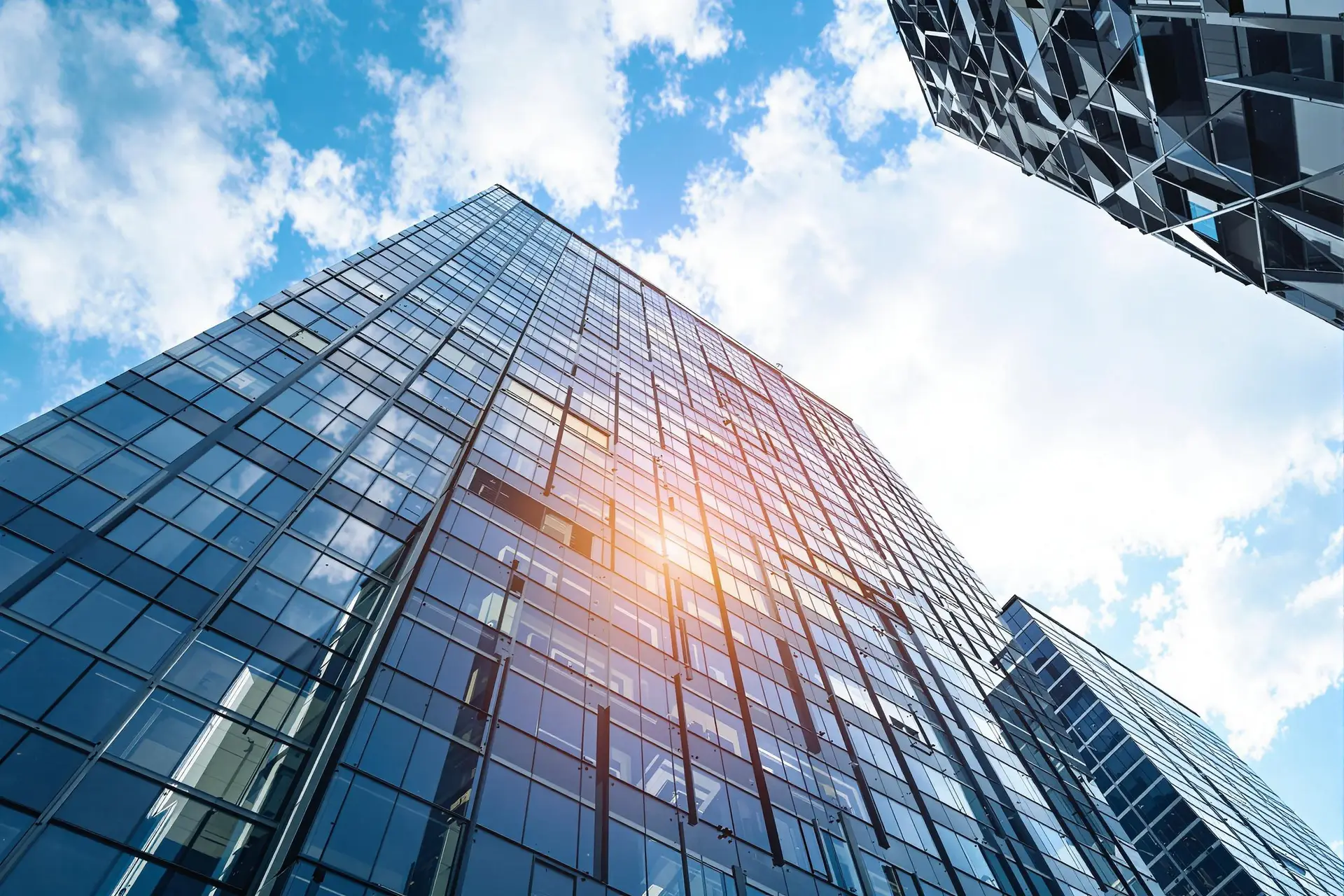 Modern skyscrapers seen from below.